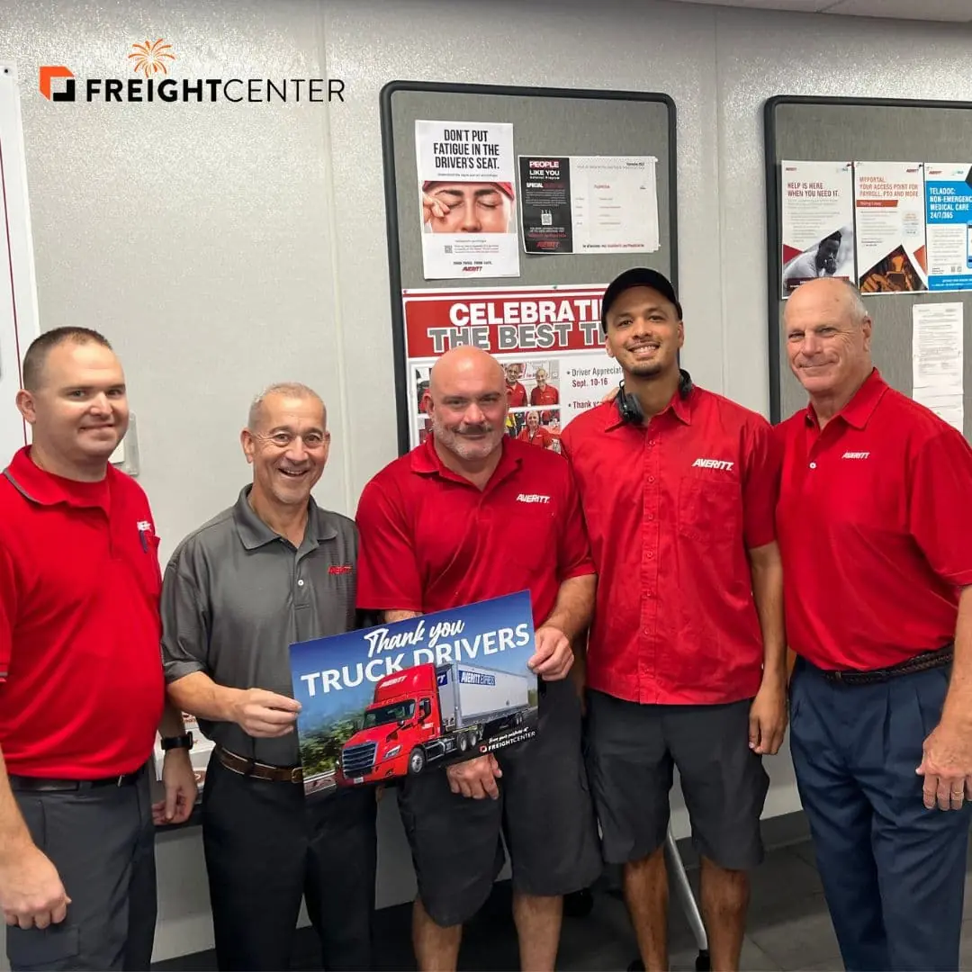 Averitt Express team members holding up a thank you truck drivers sign