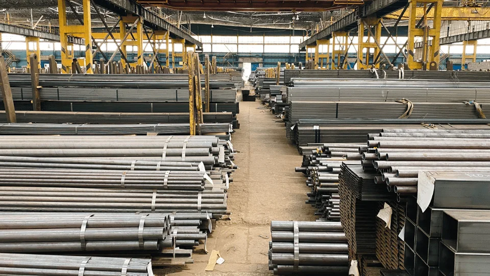 Shipping Metal and Metal Products huge warehouse filled with metal tubes and rods ready for shipping
