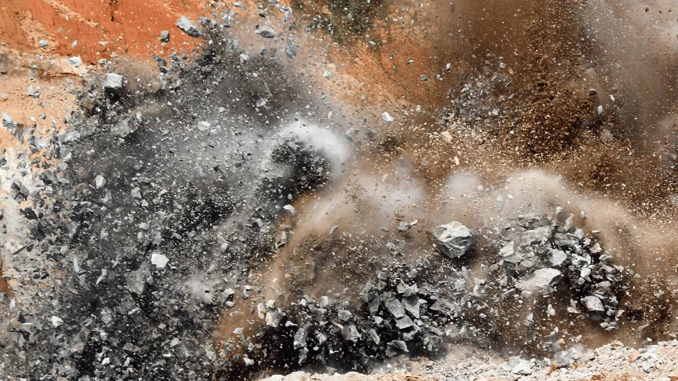 explosive blast in open cast mining quarry