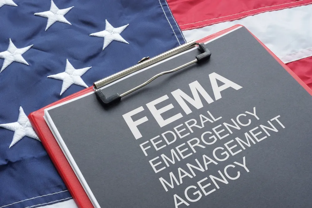 FEMA clipboard infront of the American Flag