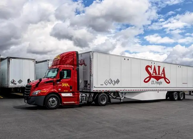 Terminal-truck-image red and white SAIA truck parked at a SAIA terminal
