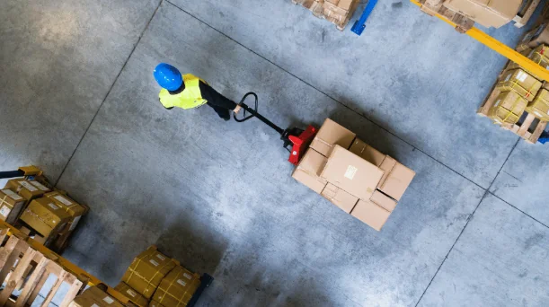 Warehouse worker moving freight